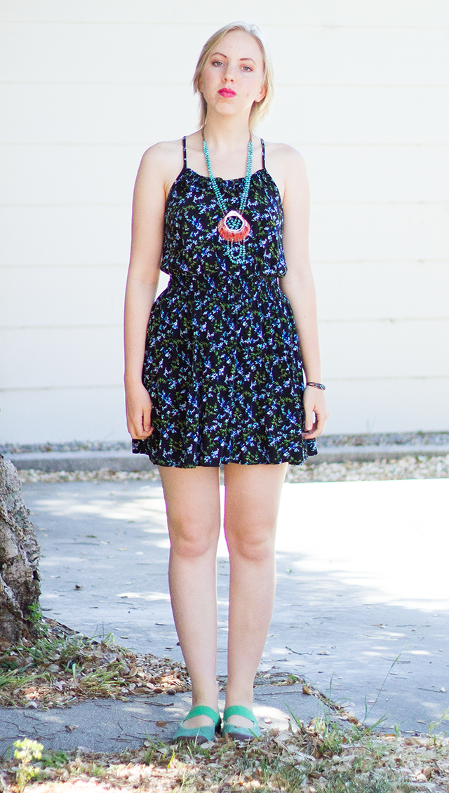 black and green floral sundress, turquoise and pink shell necklace