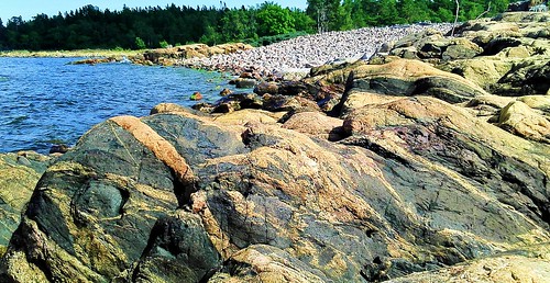 red sea cliff coast sweden granite uppland