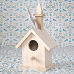 Wooden bird house with steeple