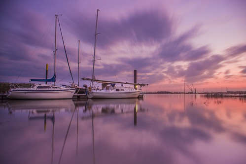 sunset sky clouds colors colorful golden beach water sunlight red reflection orange natur blue light sun landscape summer sea pink yacht boat boats