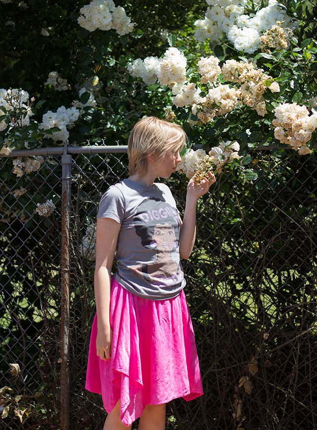 grey retro Barbie t-shirt, hot pink skirt, white roses