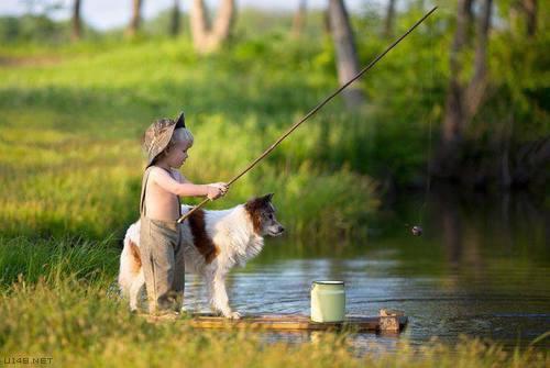 boy dog fishing