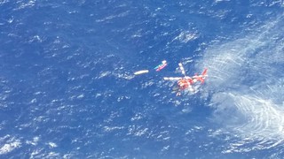 The Coast Guard rescued eight people after their vessel sank near Kaiwi Channel, Molokai, Aug. 3, 2014. An MH-65 Dolphin helicopter crew from Coast Guard Air Station Barbers Point hoisted the persons from the water and transported them to Sandy Beach Park where members from the Honolulu Fire Department were waiting. (U.S. Coast Guard photo)