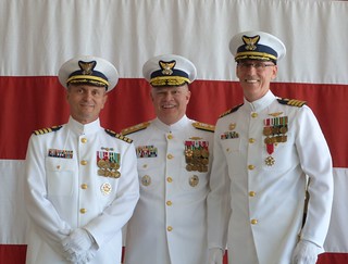 Capt. Scott Lemasters, the commander of Coast Guard Sector Detroit, Rear Adm. Fred Midgette, the commander of the Coast Guard 9th District, and Capt. Jeffrey Ogden, the former commander of Coast Guard Sector Detroit, pose for a photo during a change of command ceremony held at Air Station Detroit, June 7, 2014.  Ogden retired following 30 years of Coast Guard service after being relived by Lemasters.  U.S. Coast Guard photo courtesy of Sector Detroit
