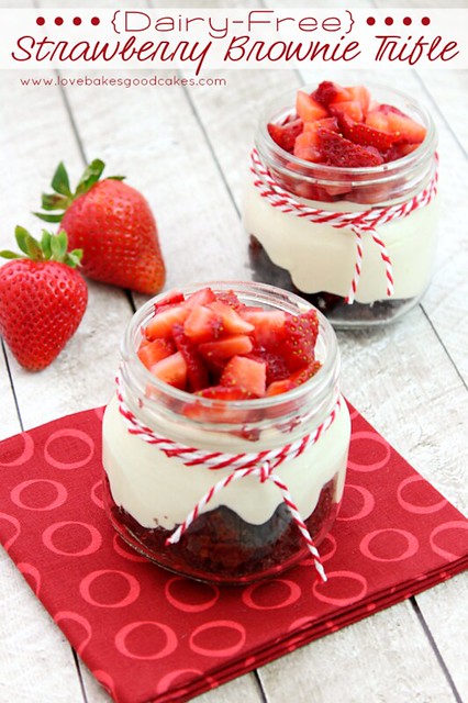 Dairy-Free Strawberry Brownie Trifle plus Protein in Almond Milk in glass jars with fresh strawberries.