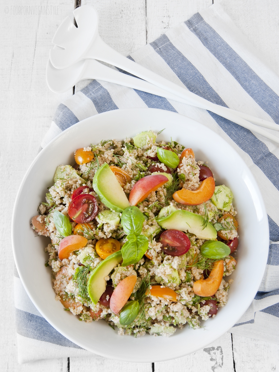 Light and fresh summer salad with couscous, cherry tomatoes, apricots and basil