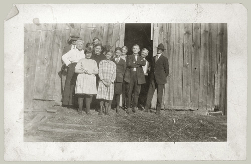 Group at barn door
