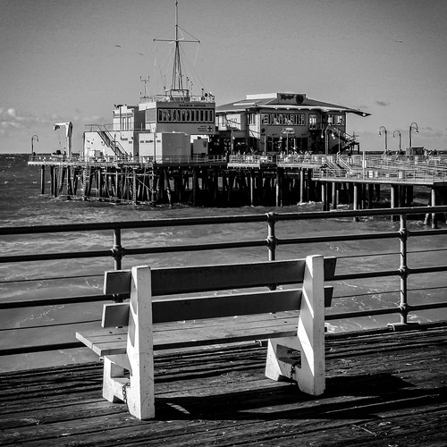 landscape seascape pier jetty bench seat empty santamonicapier california bw monochrome railing waves ocean pacific view