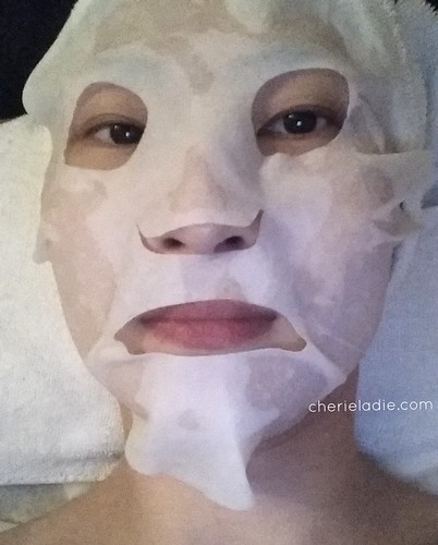 Scary face with a calming sheet mask 