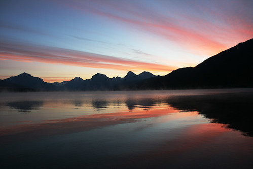 lake reflection sunrise glaciernationalpark