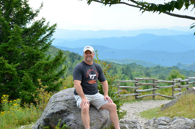 Simple photo sitting a rock with the view as the backdrop at Grayson Highlands State Park