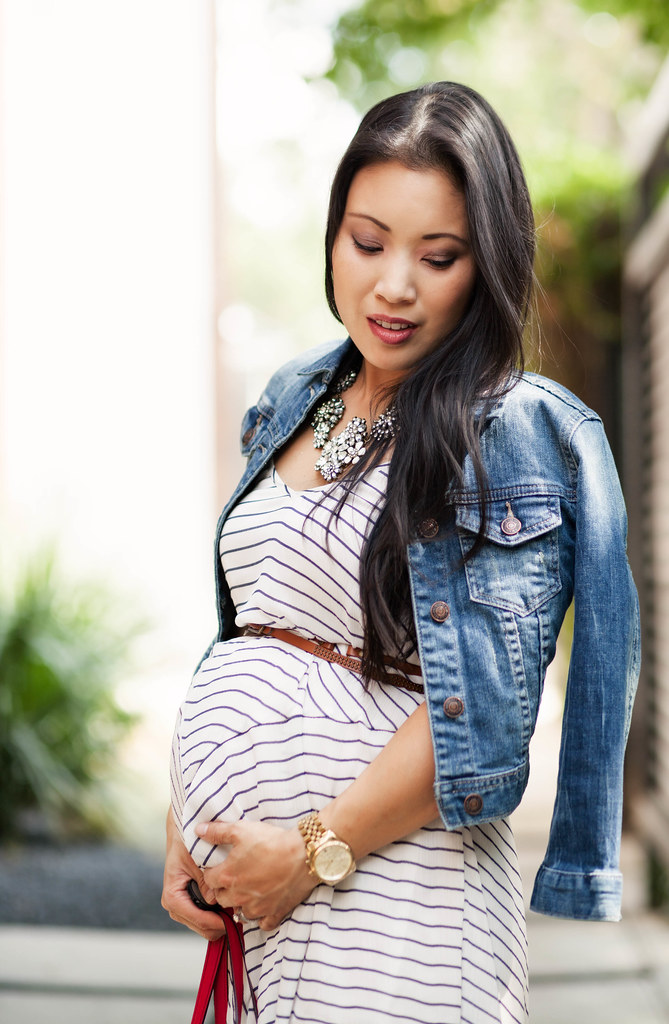 cute & little blog | petite fashion | maternity baby bump pregnant | striped trapeze dress, crystal statement necklace, denim cropped jacket, kate spade red bag | second trimester 23 weeks