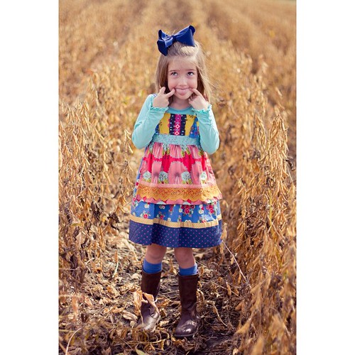 Austin's best pics are always in the soybeans.  #mamasgirl #minime #fallfamilyphotos #farmersdaughter