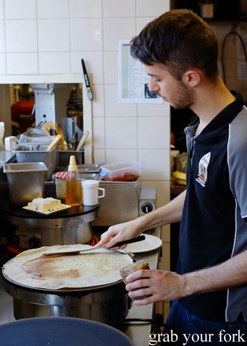 Spreading chestnut puree onto our crepe at Breizoz French Creperie, Fitzroy