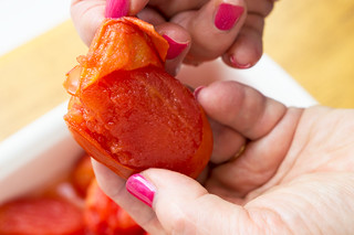peeling plum tomatoes