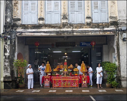 Shrine set up outside a business on Thalang Road