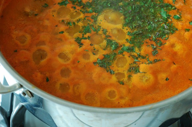 Sungold cherry tomatoes, oregano, basil, onions and garlic make a great sauce by Eve Fox, The Garden of Eating, copyright 2014